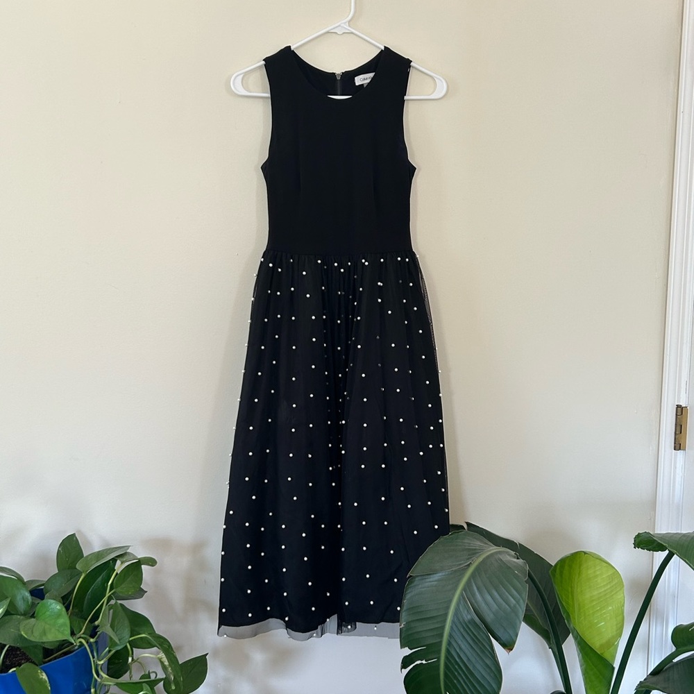 Calvin Klein dress with pearl-embellished skirt